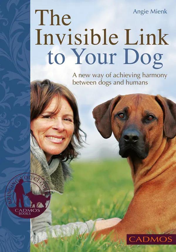 The Invisible Link to Your Dog : A new way of achiveing harmony between dogs and humans
